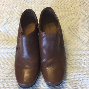 Brown Clark’s booties.